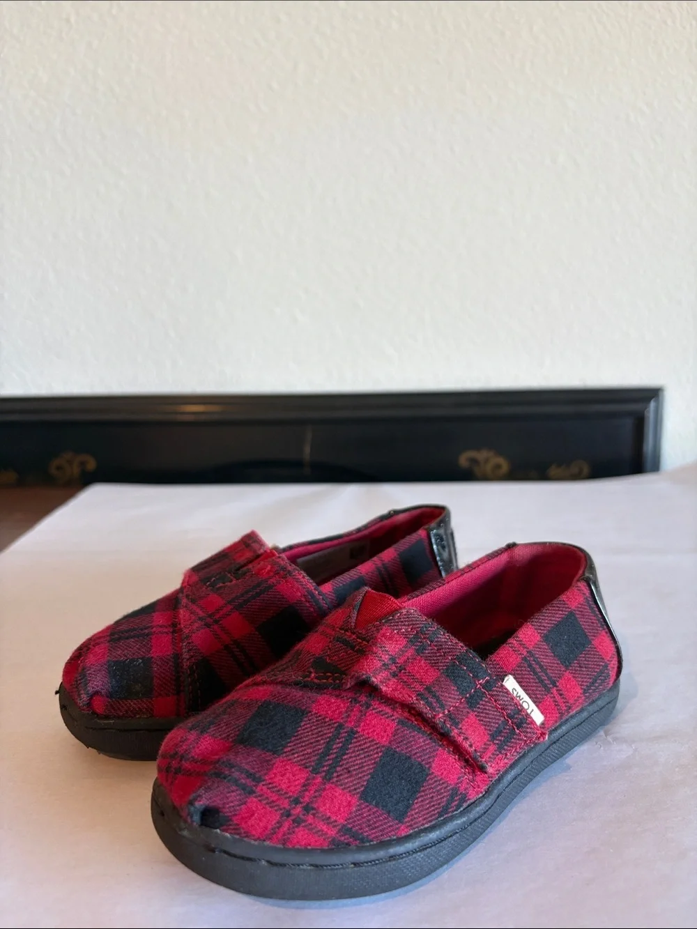 TOMS Black and Red Plaid Slip on shoes